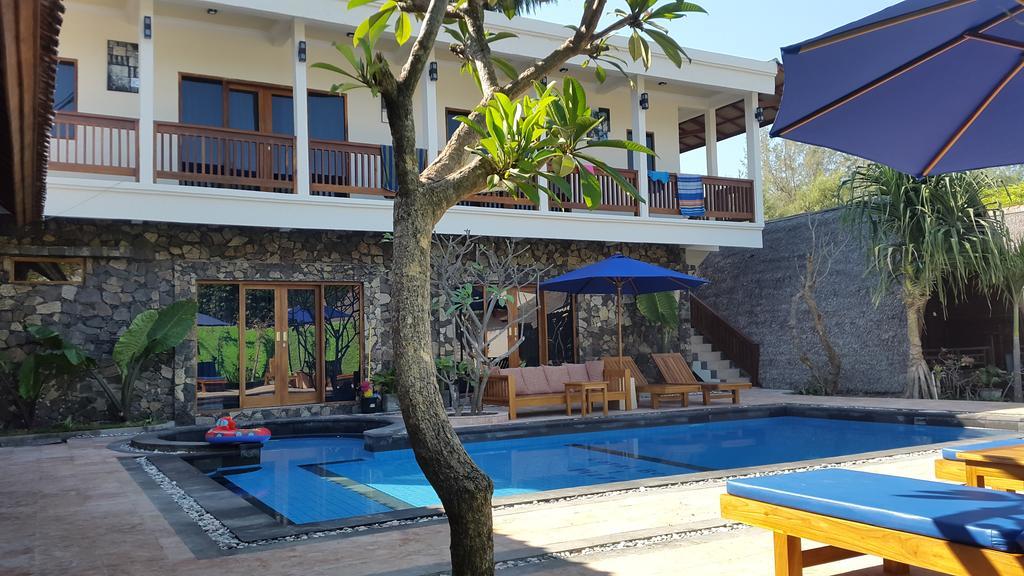 Coral Beach Pizza Cottages Гили Траванган Экстерьер фото